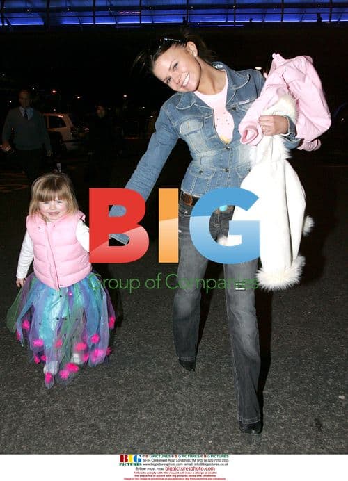 Kerry Katona with daughters at Manchester airport