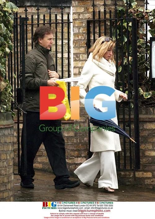 Sir Paul McCartney and Heather Mills Leaving Pizza Parlor