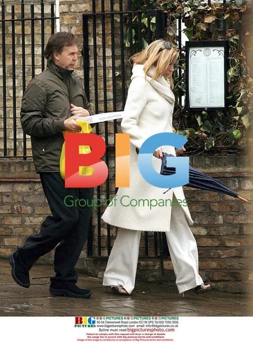 Paul McCartney and Heather Mills Leave Pizza Parlor