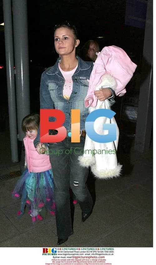 Kerry Katona and daughters arrive at airport
