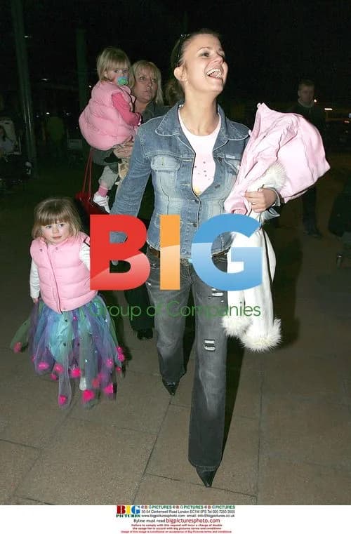 Kerry Katona with daughters at Manchester airport