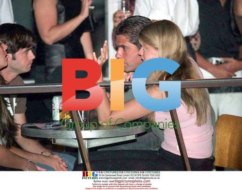 Athina Onassis and Alfonso De Miranda watch concert