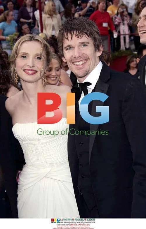 Actors JULIE DELPY and ETHAN HAWKE at 77th Oscars