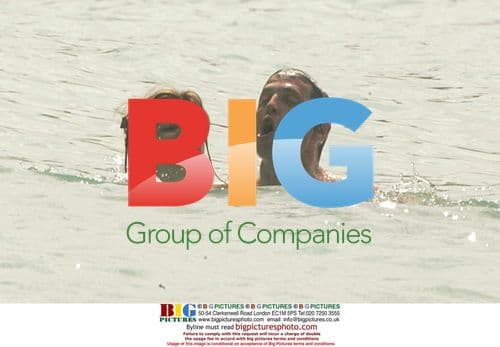 Hugh Grant and Jemima Khan swimming in Caribbean