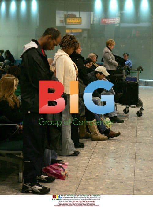 Passengers observe tsunami memorial at Heathrow