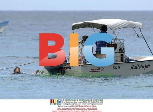 Hugh Grant and Jemima Khan Waterski in Barbados