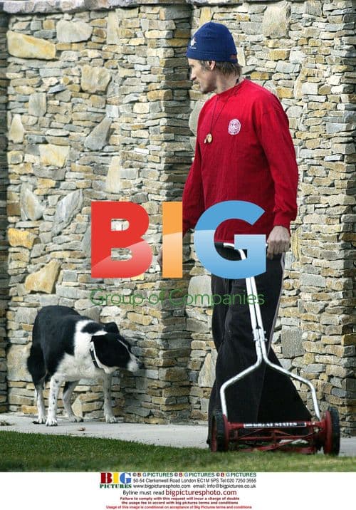 Viggo Mortensen mows his lawn in Venice, CA