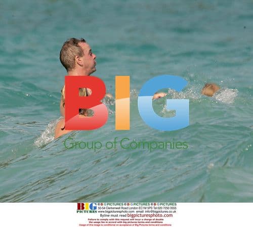 Fatboy Slim and Zoe Ball Splash in Mustique