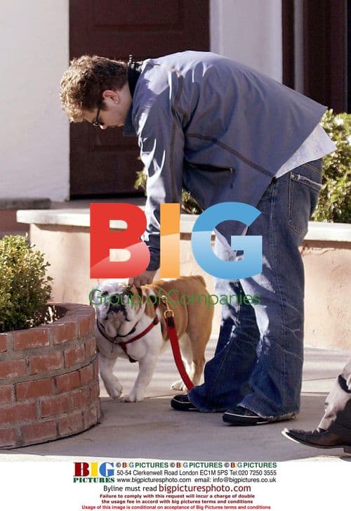 Jack Osbourne walks his dog Lola in Malibu
