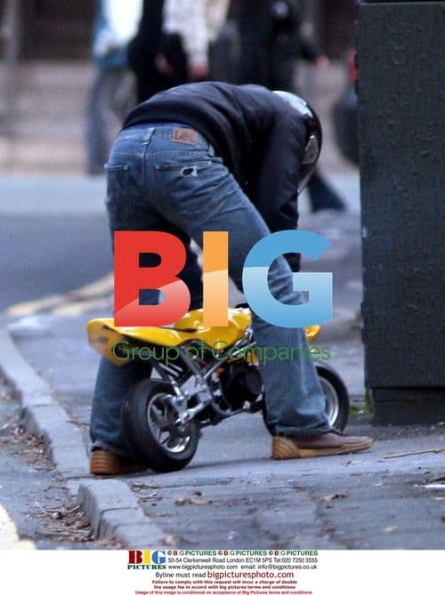 CORRIE HUNK RYAN THOMAS ON MOTORBIKE