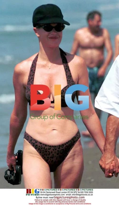 Melanie Griffith Sunbathes in Marbella