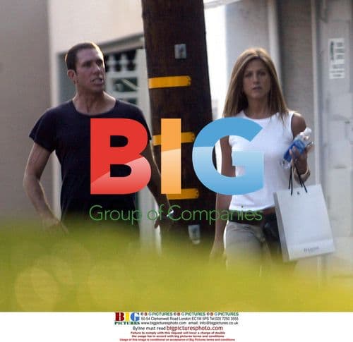 Jennifer Aniston Takes Walk with Hairstylist