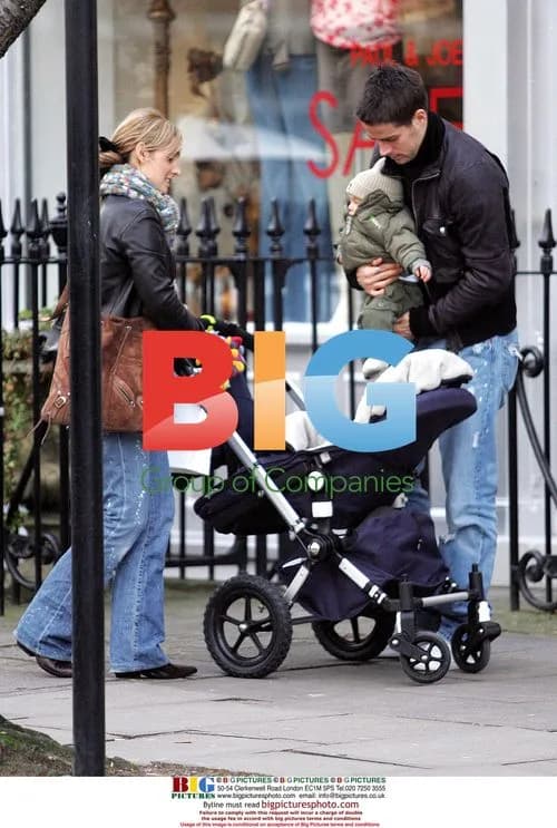 Jamie Redknapp with wife Louise and child