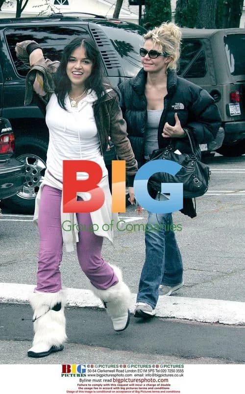 Michelle Rodriguez Strutting in Furry Boots