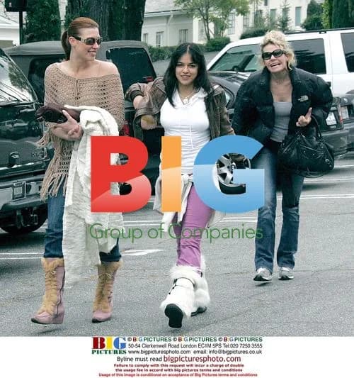Michelle Rodriguez Strutting in Furry Boots