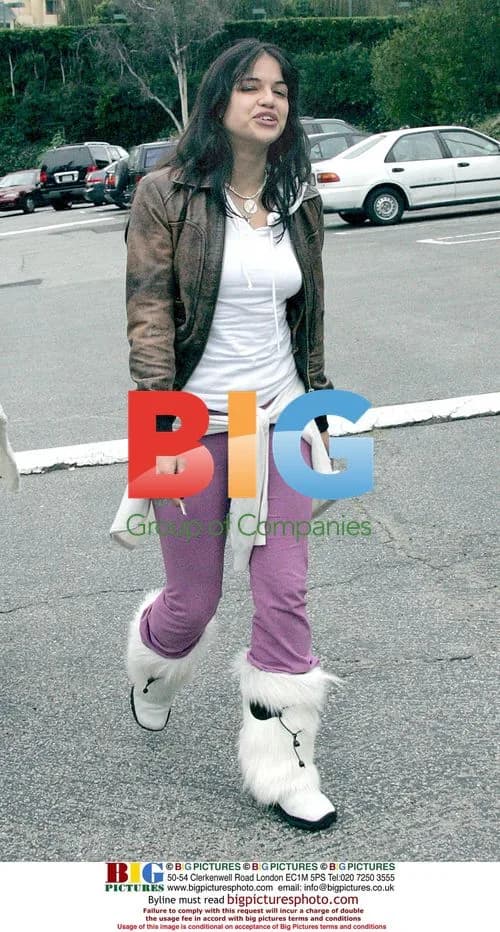 Michelle Rodriguez Strolls in Furry Boots