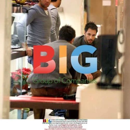 Raoul Bova shopping with wife and friend in Rome