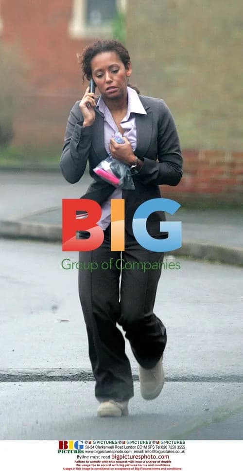 Mel B. Chats on Phone in England
