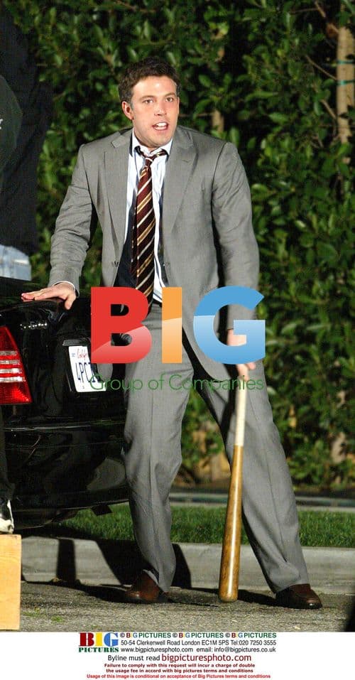 Ben Affleck and Rebecca Romijn on "Man about Town" set