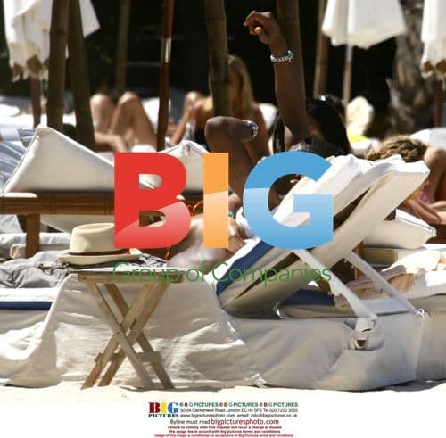 Usher Relaxing with Girlfriend in France