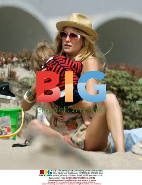 Kate Hudson with family on beach in Malibu