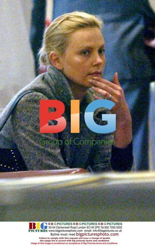 Charlize Theron Carrying Package in Beverly Hills