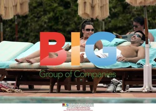 Michelle Heaton and Andy Scott-Lee by Pool