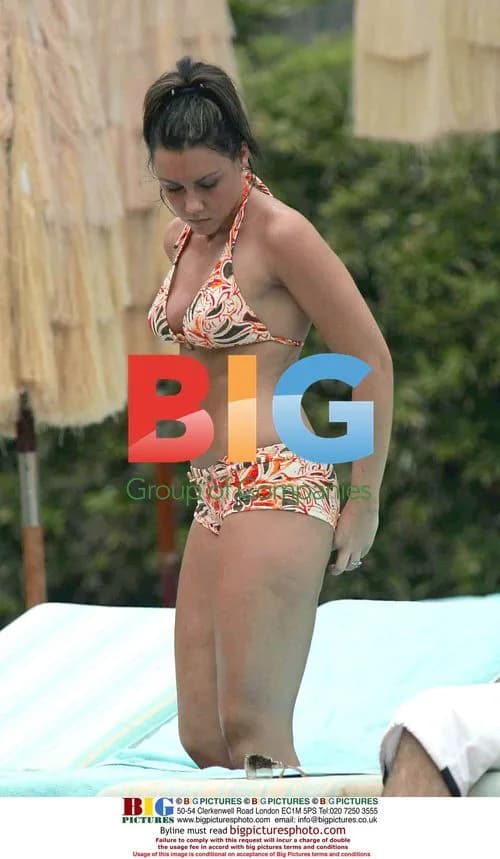 Michelle Heaton and Andy Scott-Lee by Pool