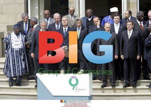 Tony Blair signs document at G8 summit