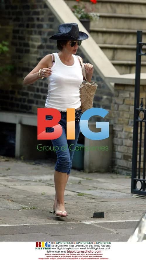 Sadie Frost with kids at Oasis gig