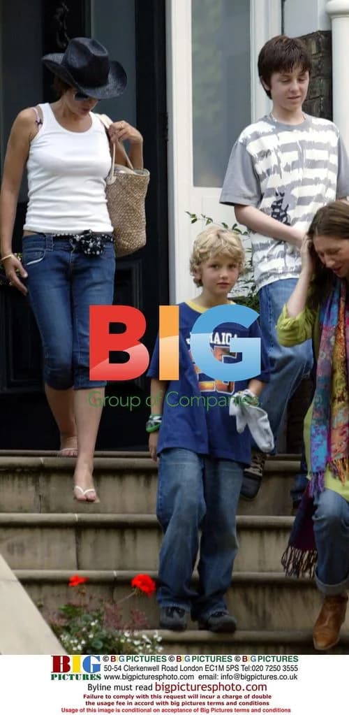 Sadie Frost with kids at Oasis gig