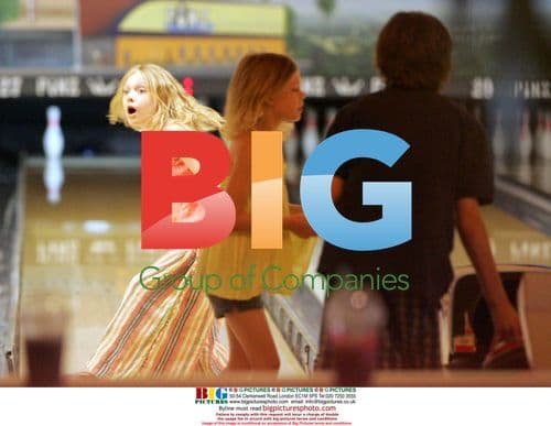 Dakota Fanning and family bowling