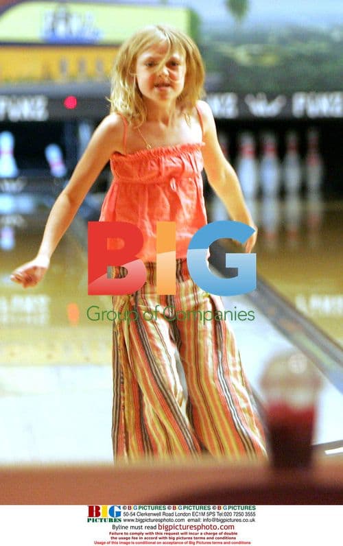 Dakota Fanning and family bowling