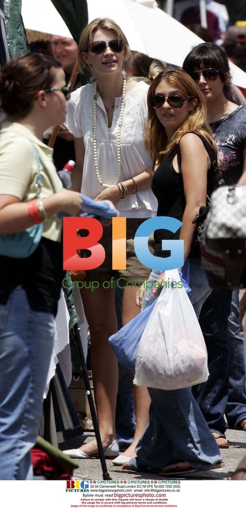 Mischa Barton with new dog at flea market