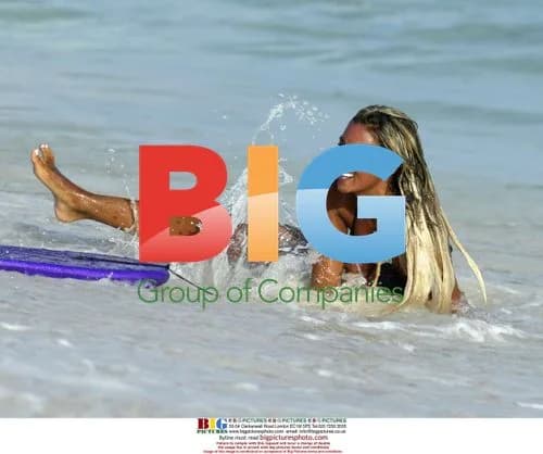 Jodie Marsh body boarding in Barbados