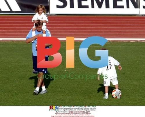 Becks Trains with Sons at Real Madrid
