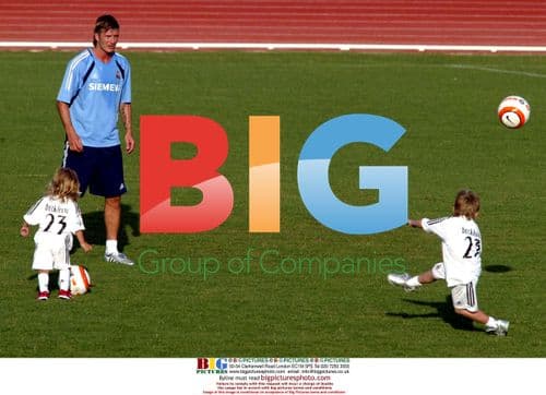 Beckham Shares Skills with Sons