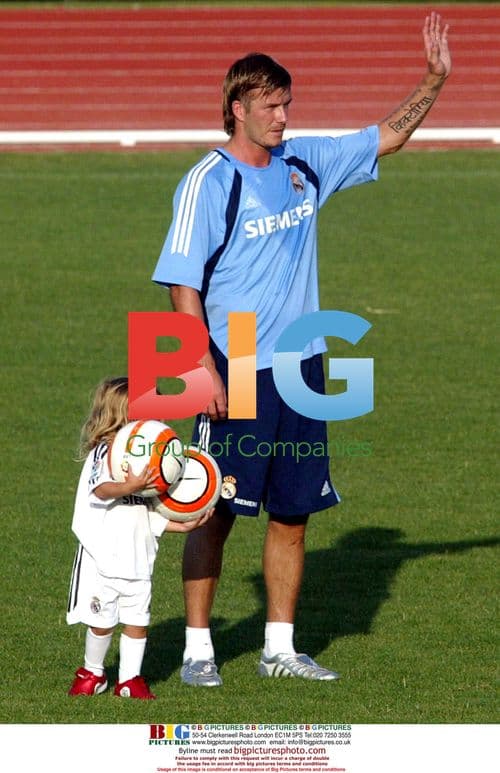 Beckham Shares Skills with Sons