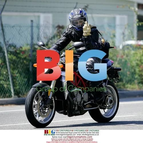 Brad Pitt Flips Off Paparazzi on Motorcycle