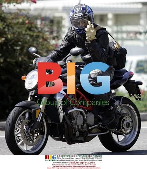 Brad Pitt Flips Off Paparazzi on Motorcycle