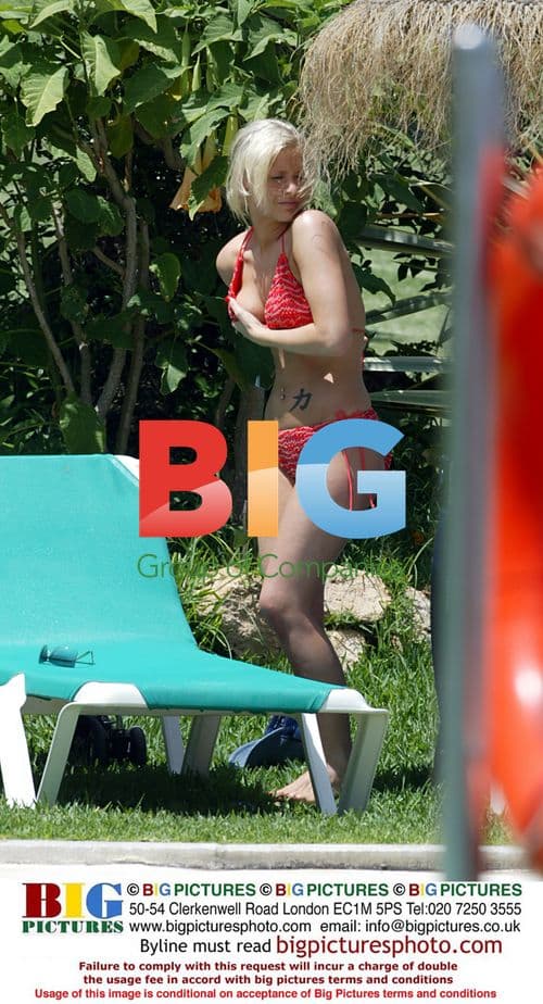 Singer Suzanne Shaw Relaxes by Pool