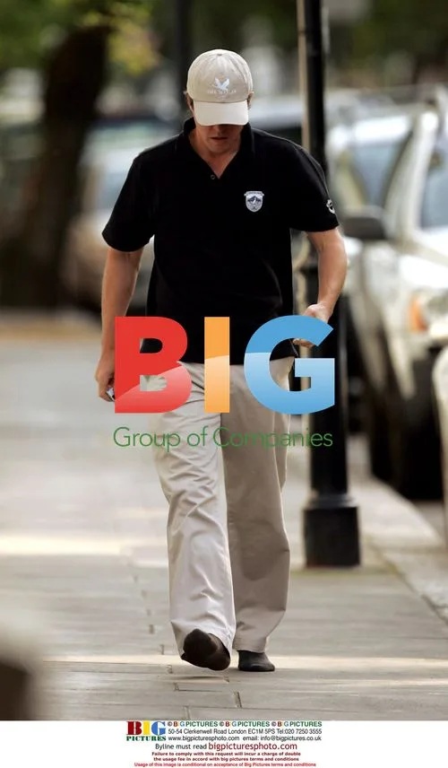 Hugh Grant Returns Home in New Porsche
