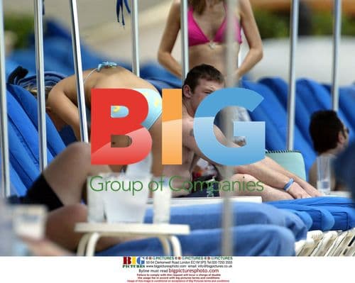 Wayne Rooney and Coleen McLoughlin on Caribbean Beach