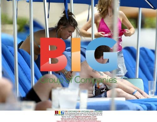Wayne Rooney and Coleen McLoughlin at Caribbean beach