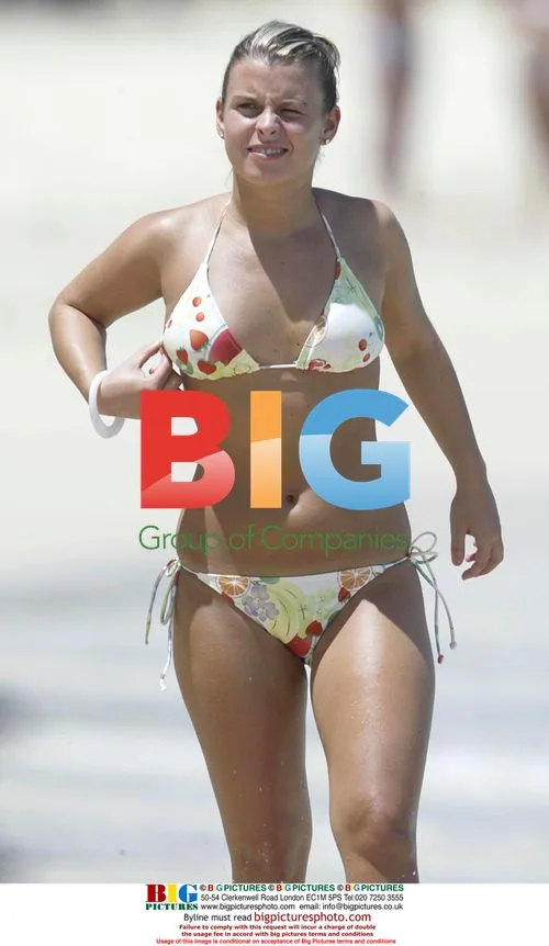 Wayne Rooney and Coleen McLoughlin on Caribbean Beach