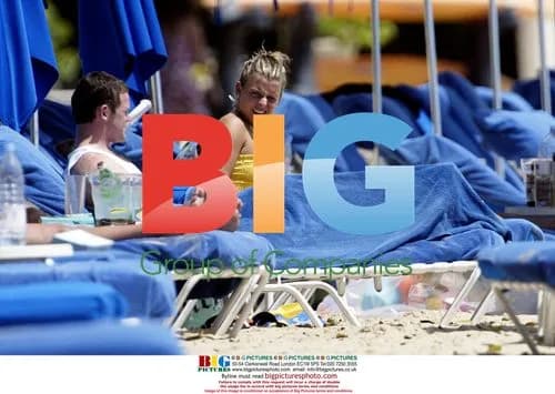 Wayne Rooney and Coleen McLoughlin on Caribbean Beach