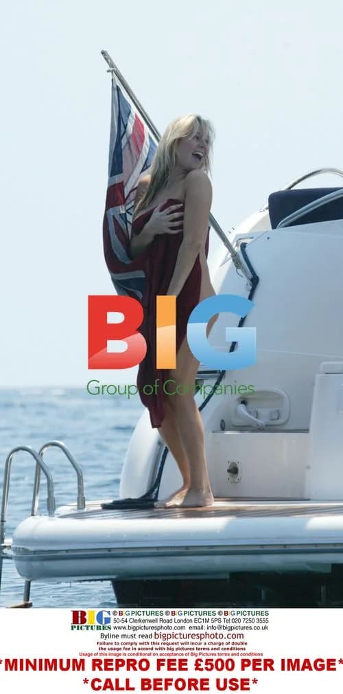 Abi Titmuss sunbathing on yacht