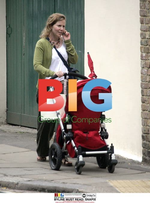 Sally Philips with baby in London