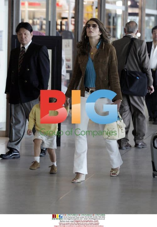 Liz Hurley with family at Paris airport