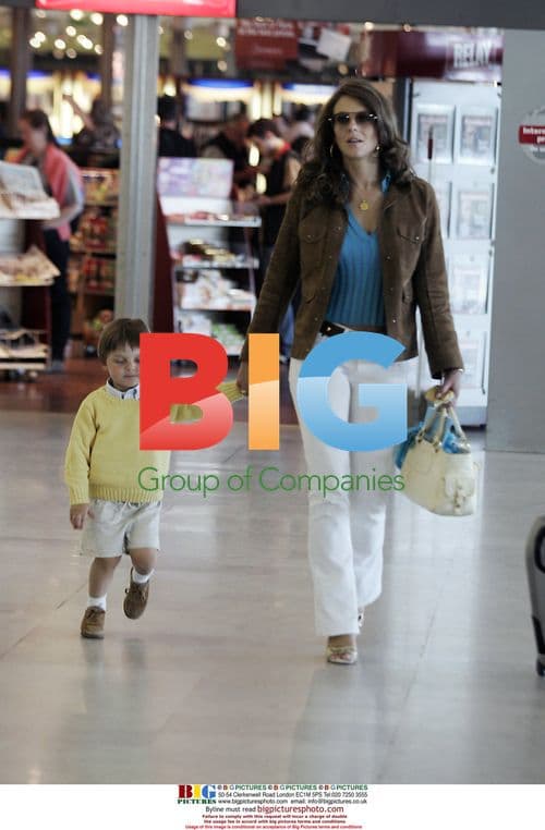 Liz Hurley with family at airport